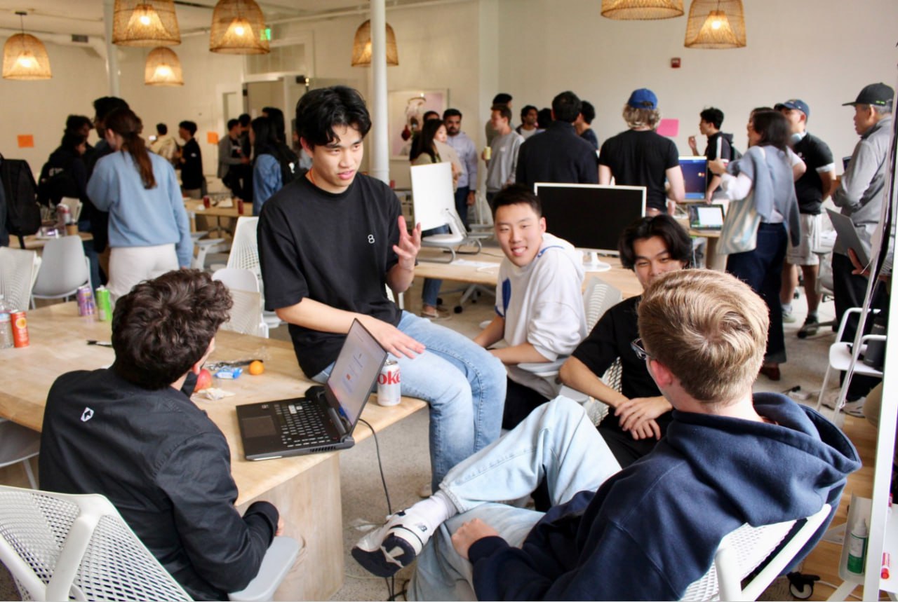 Builders working during a hackathon at The House
